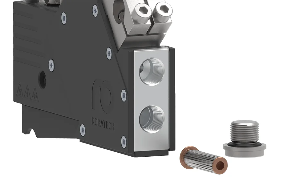 Detail vestavěného filtru a záslepky trysky hlavy SpeedStar Compact