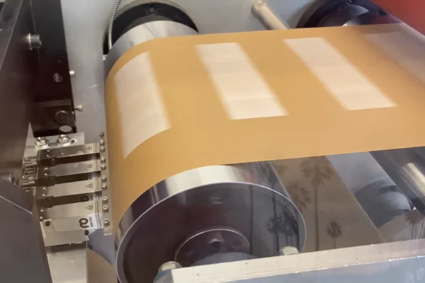 Coating application by the Presto head on the production line