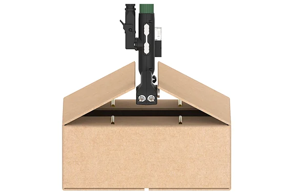 Dual Twist 2 head in a low-profile application closing a cardboard box